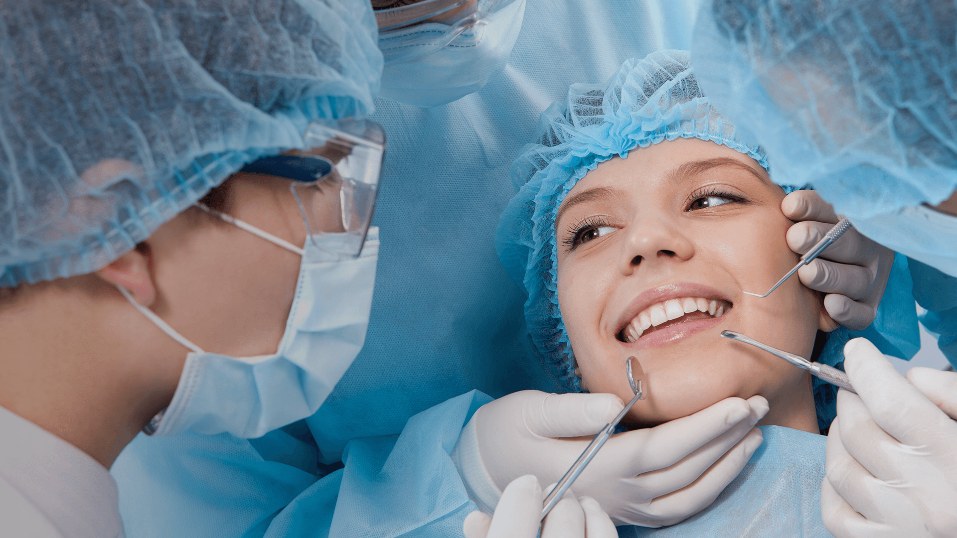 A woman receiving dental work.