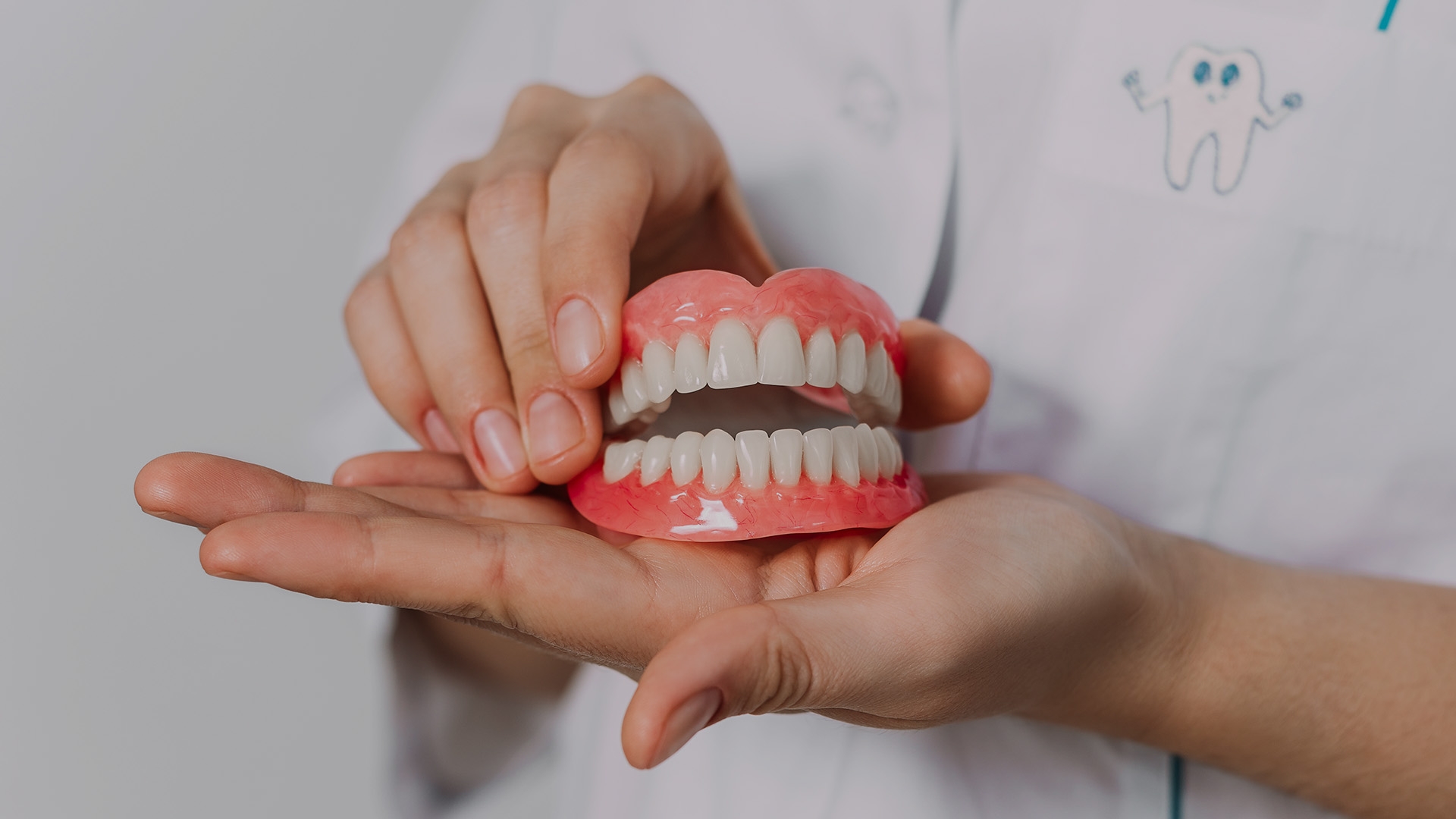 Patient at dentist during routine denture check-up